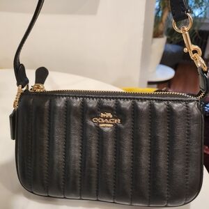 Coach mini bag / wristlet / shoulder soft black cushion leather.